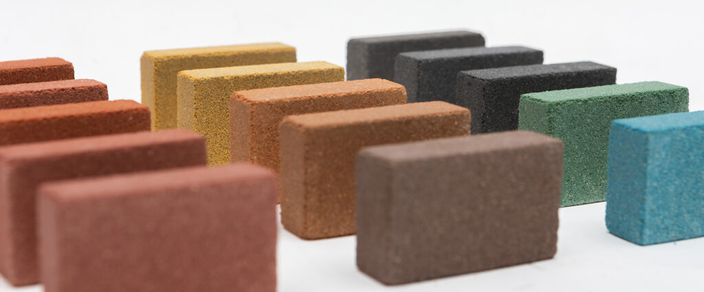 Colored bricks made of iron oxide pigment